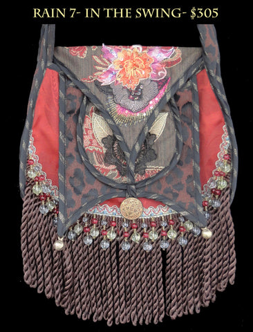 * RAIN BAG 7- IN THE SWING- $305